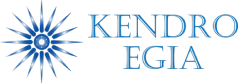 Logo featuring the word "kendroegia" in capital letters with a stylized blue and white starburst on the left.