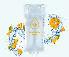 A transparent IV bag labeled "Immunity Drip" with splashes of water, ice cubes, and orange slices surrounding it.
