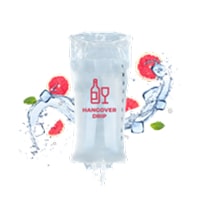 A medical IV bag labeled "Hangover Drip" with illustrations of water splashes, ice cubes, and fruit slices in the background.